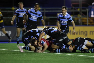 070123 - Cardiff Rugby v Scarlets - United Rugby Championship - Dane Blacker of Scarlets gets over the line to score a try