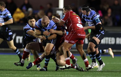 070123 - Cardiff Rugby v Scarlets - United Rugby Championship - Dmitri Arhip of Cardiff is tackled by Kemsley Mathias of Scarlets 