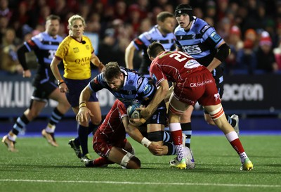 070123 - Cardiff Rugby v Scarlets - United Rugby Championship - Josh Turnbull of Cardiff is tackled by Tomas Lezana of Scarlets 