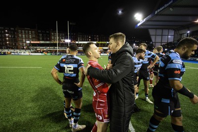 070123 - Cardiff Rugby v Scarlets - United Rugby Championship - Gareth Davies and Liam Williams of Cardiff at full time