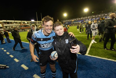 070123 - Cardiff Rugby v Scarlets - United Rugby Championship - Jarrod Evans of Cardiff with fans at full time