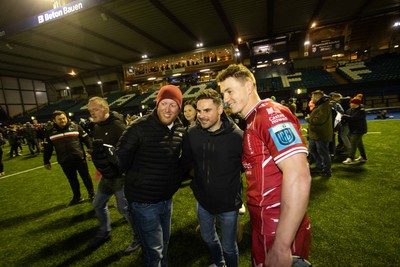 070123 - Cardiff Rugby v Scarlets - United Rugby Championship - Jonathan Davies of Scarlets with fans at full time