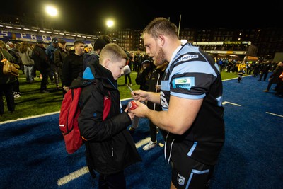 070123 - Cardiff Rugby v Scarlets - United Rugby Championship - Corey Domachowski of Cardiff with fans at full time