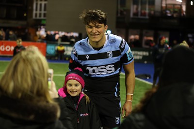 070123 - Cardiff Rugby v Scarlets - United Rugby Championship - Teddy Williams of Cardiff with fans at full time