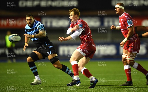 070123 - Cardiff v Scarlets - United Rugby Championship - Rhys Patchell of Scarlets gets the ball away