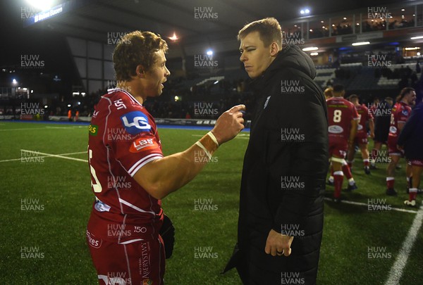 070123 - Cardiff v Scarlets - United Rugby Championship - Leigh Halfpenny and Liam Williams of Cardiff at the end of the game