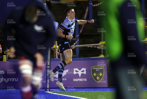 070123 - Cardiff Rugby v Scarlets - United Rugby Championship - Josh Adams of Cardiff celebrates scoring a try