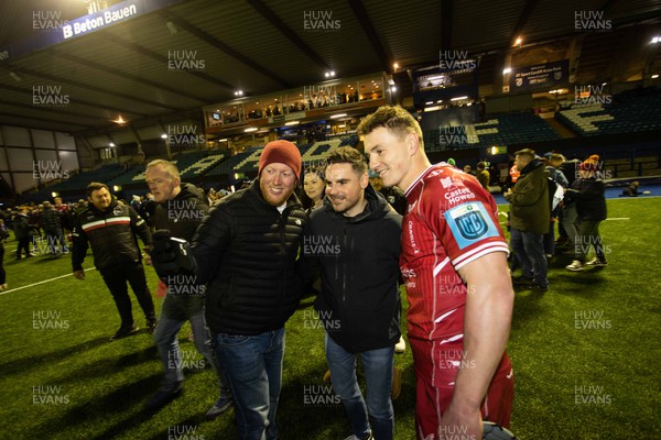 070123 - Cardiff Rugby v Scarlets - United Rugby Championship - Jonathan Davies of Scarlets with fans at full time