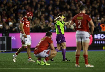 191225 - Cardiff Rugby v Scarlets - United Rugby Championship - Referee Ben Breakspear gives Josh Macleod of Scarlets a yellow card