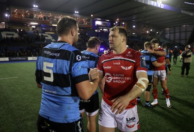 191225 - Cardiff Rugby v Scarlets - United Rugby Championship - George Nott of Cardiff and Ryan Elias of Scarlets at full time