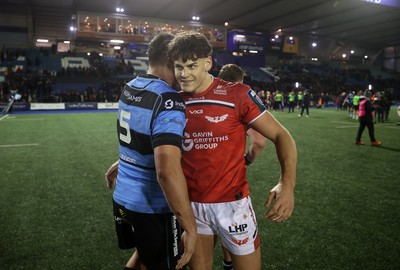 191225 - Cardiff Rugby v Scarlets - United Rugby Championship - George Nott of Cardiff and Eddie James of Scarlets at full time