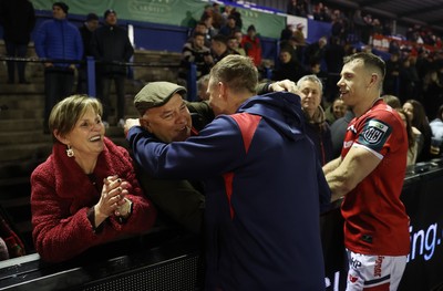 191225 - Cardiff Rugby v Scarlets - United Rugby Championship - Gareth Davies of Scarlets with family at full time