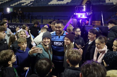191225 - Cardiff Rugby v Scarlets - United Rugby Championship - Taulupe Faletau of Cardiff with fans at full time