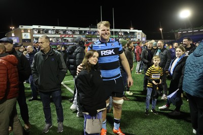 191225 - Cardiff Rugby v Scarlets - United Rugby Championship - Josh McNally of Cardiff with fans at full time