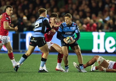 191225 - Cardiff Rugby v Scarlets, United Rugby Championship - Callum Sheedy of Cardiff Rugby is held