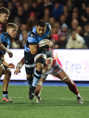 191225 - Cardiff Rugby v Scarlets, United Rugby Championship -Taulupe Faletau of Cardiff Rugby takes on Blair Murray of Scarlets as he charges for the line