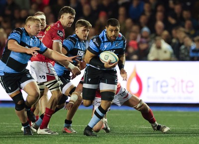 191225 - Cardiff Rugby v Scarlets, United Rugby Championship -Taulupe Faletau of Cardiff Rugby takes on Blair Murray of Scarlets as he charges for the line