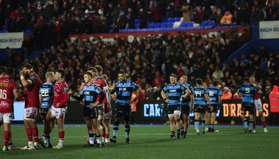 191225 - Cardiff Rugby v Scarlets, United Rugby Championship -The players congratulate each other at the end of the match