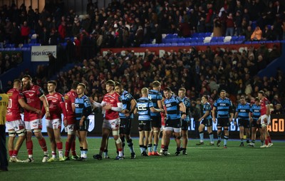 191225 - Cardiff Rugby v Scarlets, United Rugby Championship -The players congratulate each other at the end of the match