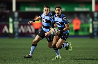 191225 - Cardiff Rugby v Scarlets, United Rugby Championship - Ben Thomas of Cardiff Rugby and Josh Adams of Cardiff Rugby