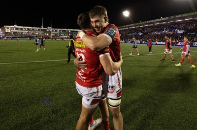 191225 - Cardiff Rugby v Scarlets, United Rugby Championship - Johnny Williams of Scarlets and Max Douglas of Scarlets at the end of the match