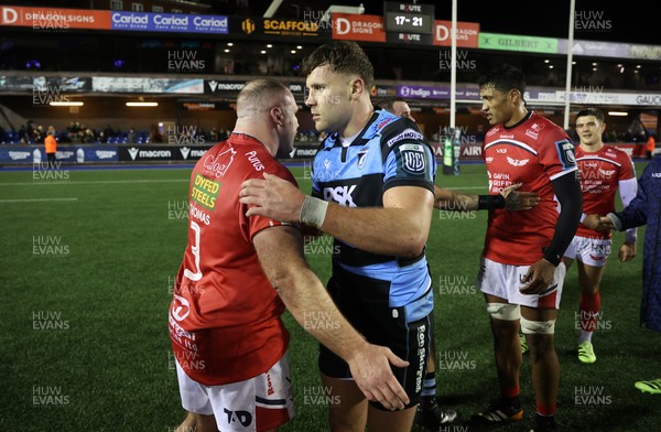 191225 - Cardiff Rugby v Scarlets - United Rugby Championship - Henry Thomas of Scarlets and Mason Grady of Cardiff at full time