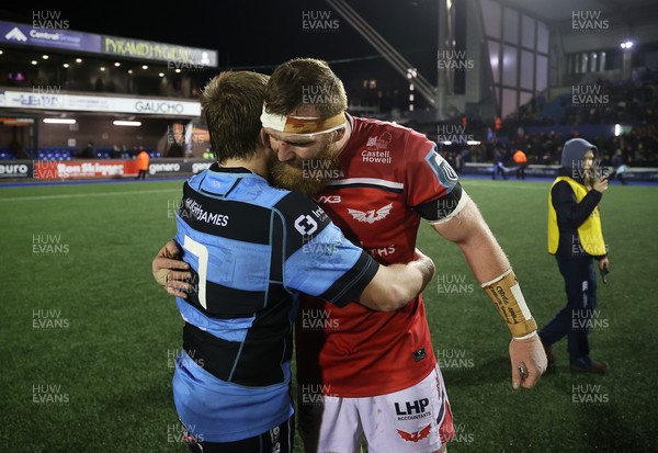 191225 - Cardiff Rugby v Scarlets - United Rugby Championship - Dan Thomas of Cardiff and Jake Ball of Scarlets at full time