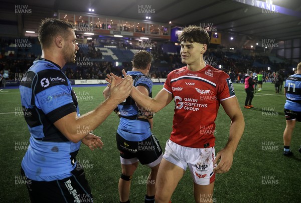 191225 - Cardiff Rugby v Scarlets - United Rugby Championship - George Nott of Cardiff and Eddie James of Scarlets at full time