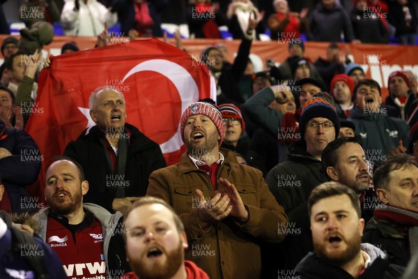 191225 - Cardiff Rugby v Scarlets - United Rugby Championship - Scarlets celebrate with fans at full time