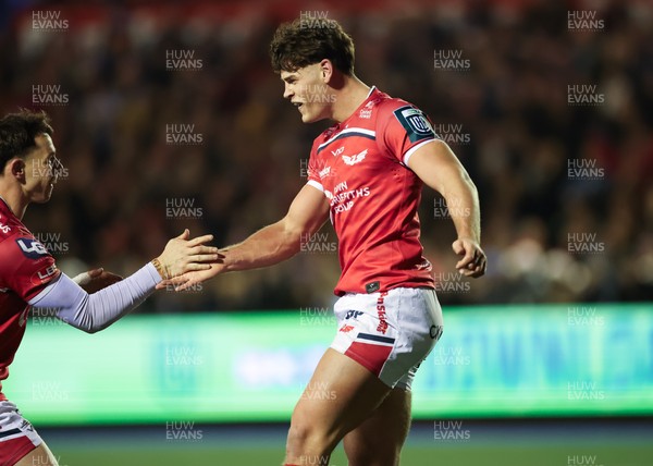 191225 - Cardiff Rugby v Scarlets, United Rugby Championship - Eddie James of Scarlets celebrates after he races in to score try
