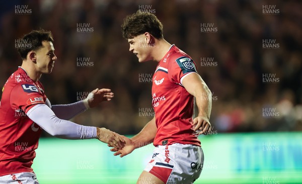 191225 - Cardiff Rugby v Scarlets, United Rugby Championship - Eddie James of Scarlets celebrates after he races in to score try