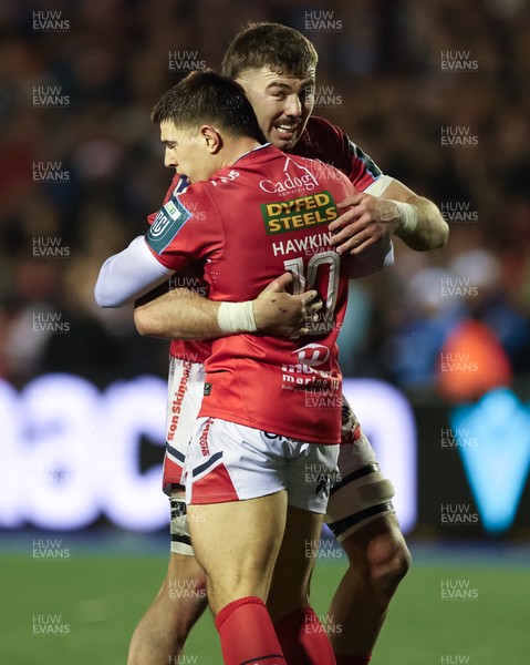 191225 - Cardiff Rugby v Scarlets, United Rugby Championship - Max Douglas of Scarlets and Joe Hawkins of Scarlets celebrate at the end of the match