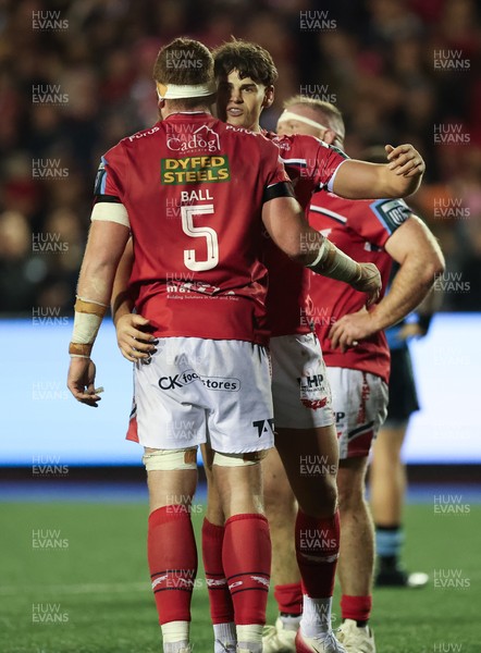191225 - Cardiff Rugby v Scarlets, United Rugby Championship - Scarlets players celebrate at the end of the match