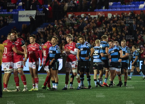 191225 - Cardiff Rugby v Scarlets, United Rugby Championship -The players congratulate each other at the end of the match