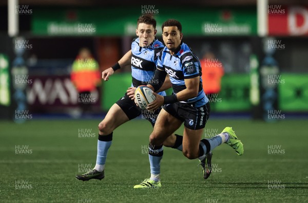191225 - Cardiff Rugby v Scarlets, United Rugby Championship - Ben Thomas of Cardiff Rugby and Josh Adams of Cardiff Rugby