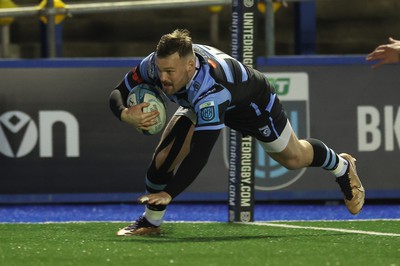 040323 - Cardiff Rugby v Ulster, BKT United Rugby Championship - Owen Lane of Cardiff Rugby dives in to score try