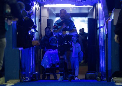 040323 - Cardiff Rugby v Ulster, BKT United Rugby Championship - Rey Lee-Lo of Cardiff Rugby and his family lead the team out on the occasion of his 150th cap for the region