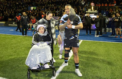 040323 - Cardiff Rugby v Ulster, BKT United Rugby Championship - Rey Lee-Lo of Cardiff Rugby and his family lead the team out on the occasion of his 150th cap for the region