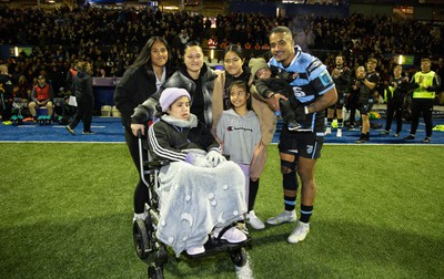 040323 - Cardiff Rugby v Ulster, BKT United Rugby Championship - Rey Lee-Lo of Cardiff Rugby and his family lead the team out on the occasion of his 150th cap for the region