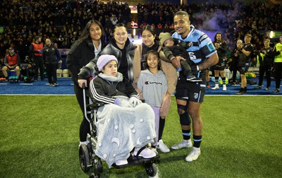 040323 - Cardiff Rugby v Ulster, BKT United Rugby Championship - Rey Lee-Lo of Cardiff Rugby and his family lead the team out on the occasion of his 150th cap for the region