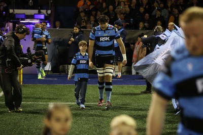 131225 - Cardiff Rugby v Ulster - United Rugby Championship - Rory Thornton of Cardiff walks on for his 100th cap