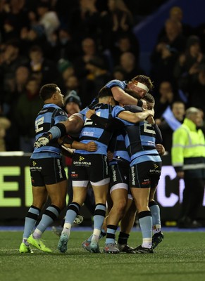 131225 - Cardiff Rugby v Ulster - United Rugby Championship - Callum Sheedy of Cardiff celebrates with teams mates after winning the game