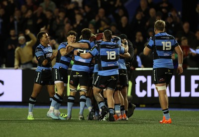 131225 - Cardiff Rugby v Ulster - United Rugby Championship - Callum Sheedy of Cardiff celebrates with teams mates after winning the game