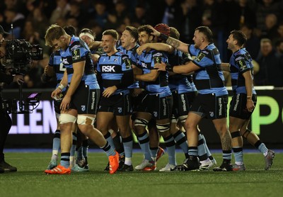 131225 - Cardiff Rugby v Ulster - United Rugby Championship - Callum Sheedy of Cardiff celebrates with teams mates after winning the game