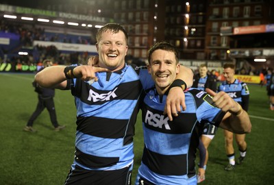 131225 - Cardiff Rugby v Ulster - United Rugby Championship - Evan Lloyd and Harri Millard of Cardiff celebrate at full time