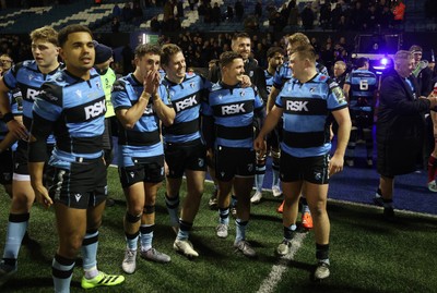131225 - Cardiff Rugby v Ulster - United Rugby Championship - Callum Sheedy of Cardiff celebrates at full time with team mates