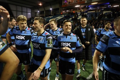 131225 - Cardiff Rugby v Ulster - United Rugby Championship - Callum Sheedy of Cardiff celebrates at full time with team mates