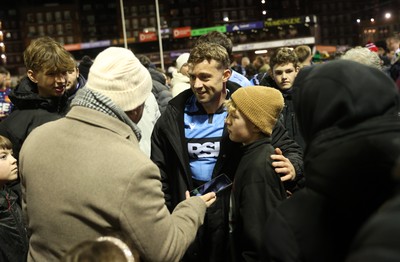 131225 - Cardiff Rugby v Ulster - United Rugby Championship - Leigh Halfpenny of Cardiff with fans at full time