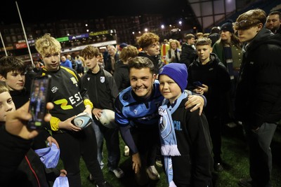 131225 - Cardiff Rugby v Ulster - United Rugby Championship - Callum Sheedy of Cardiff with fans at full time