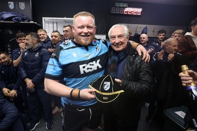 131225 - Cardiff Rugby v Ulster - United Rugby Championship - Keiron Assiratti of Cardiff receives his 100th cap from Sir Gareth Edwards
